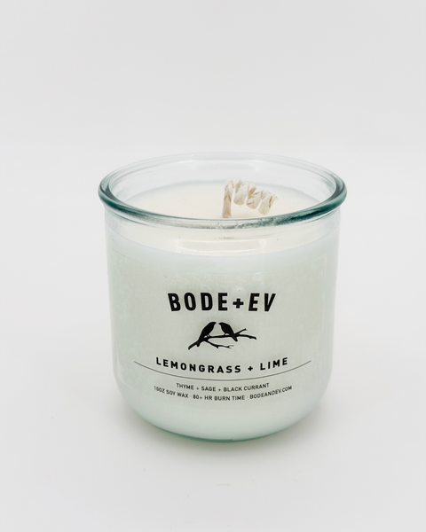 Lemongrass + Lime luxury soy wax candle with fresh citrus and herbal notes, hand-poured in a minimalist glass vessel.