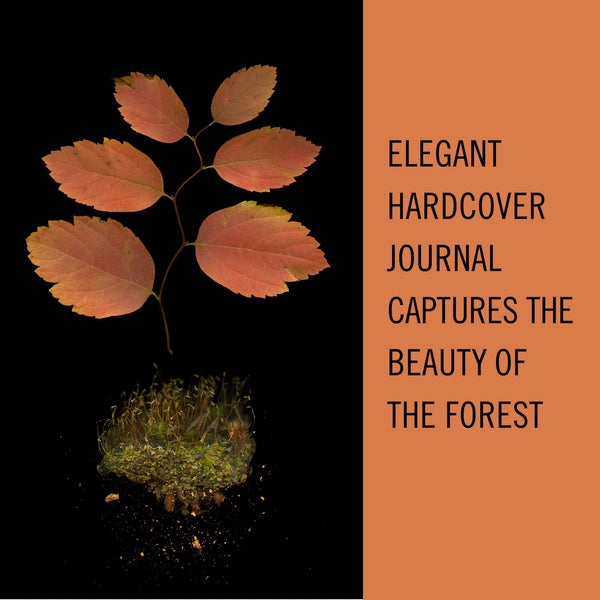 Elegant hardcover journal with leaf and moss design on black background